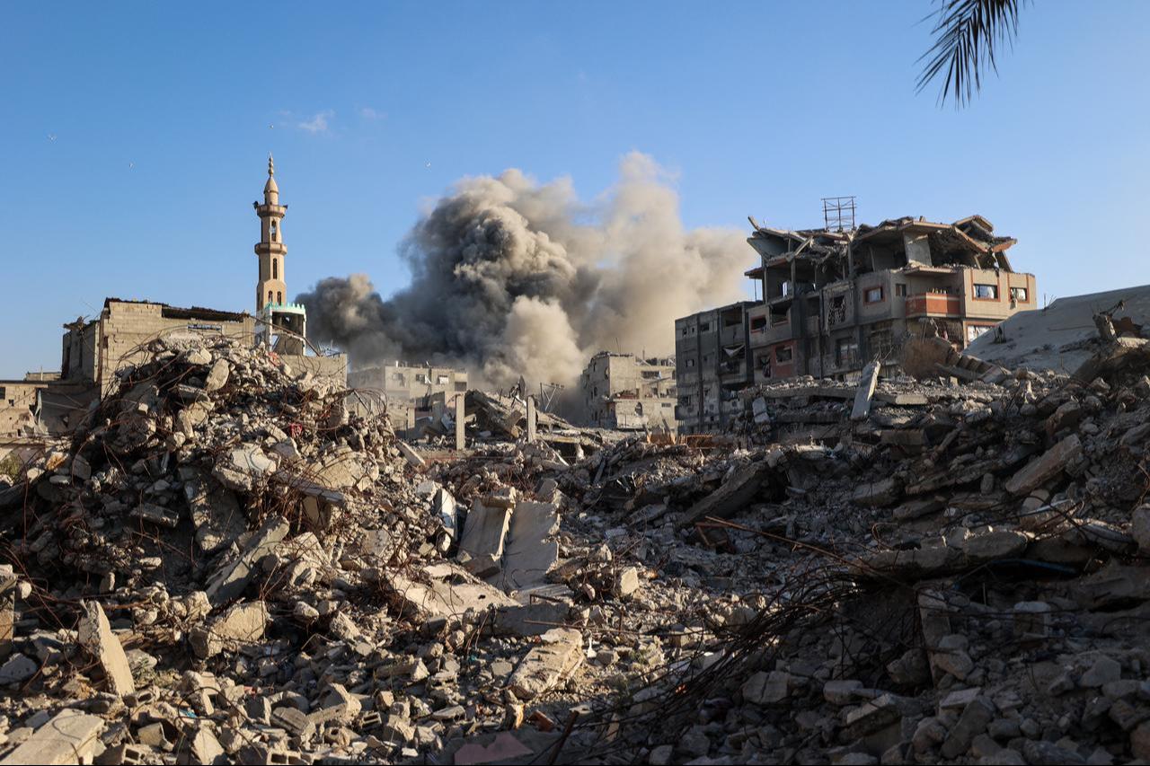Smoke billows following an Israeli strike that targeted a building in the Bureij camp for Palestinian refugees in central Gaza Strip, Oct. 19, 2025. (AFP Photo)