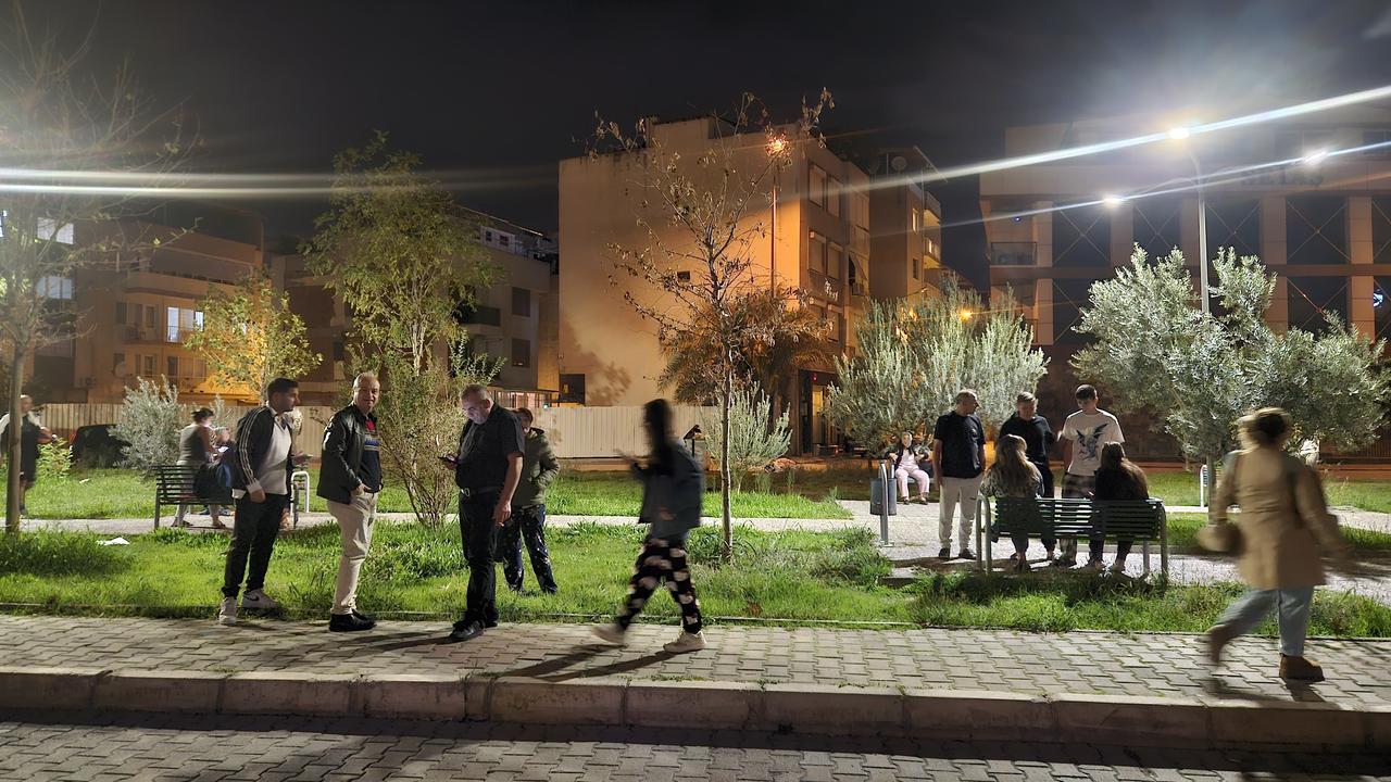 Residents gather in a park following the magnitude 6.1 earthquake that struck Sındırgı district in Balıkesir province at 10:48 p.m., in Izmir, Türkiye on Oct. 27, 2025. (AA Photo)