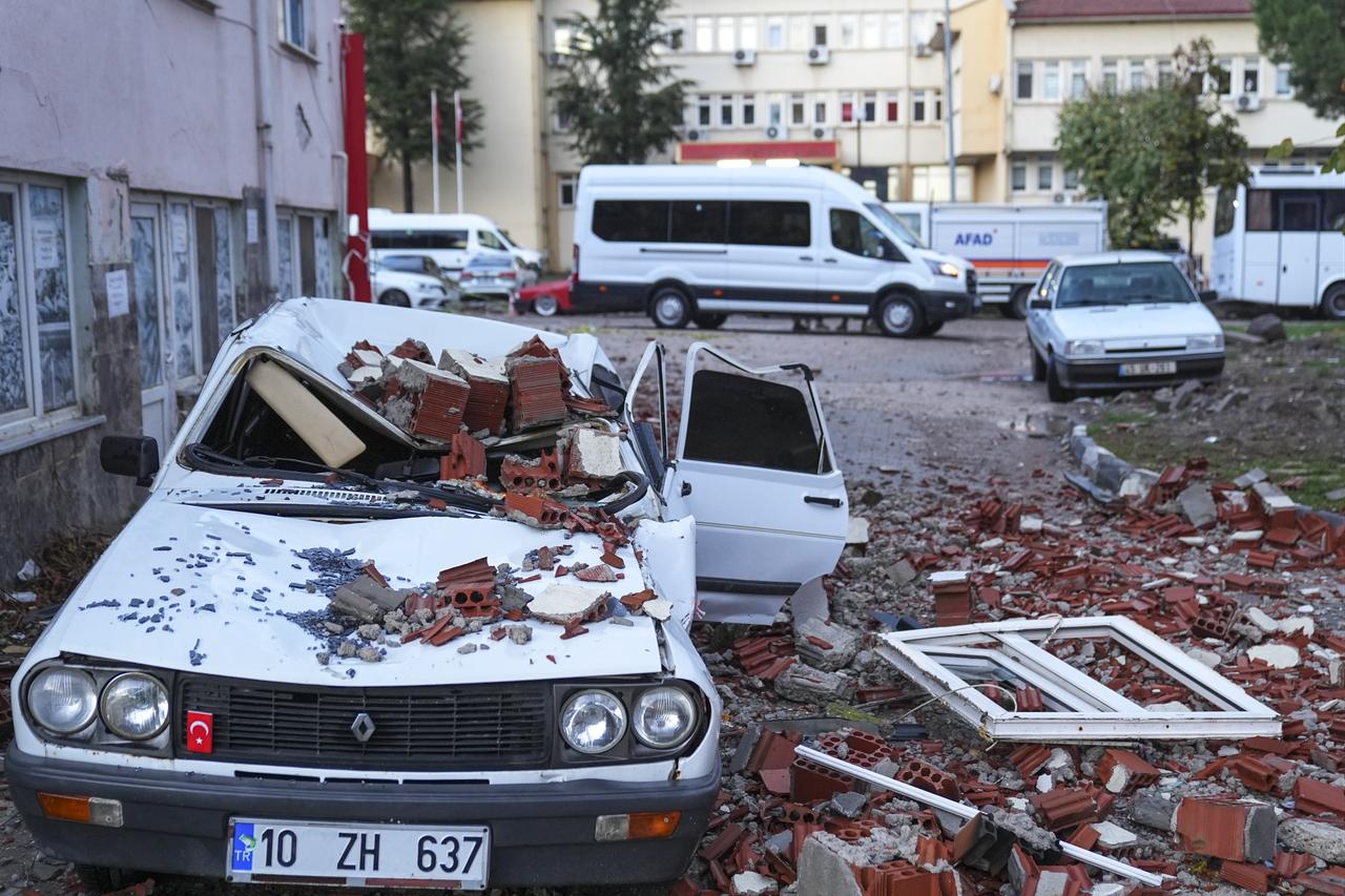 A general view shows the collapsed building after a 6.1 magnitude earthquake struck in the Sindirgi district at 22:48 local time in Balikesir, Türkiye, on Oct. 28, 2025. (AA Photo)