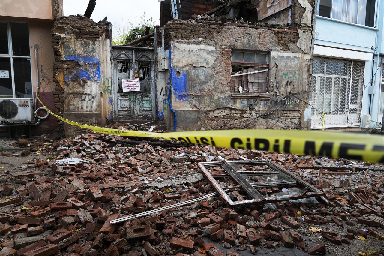 A general view shows the collapsed building after a 6.1 magnitude earthquake struck in the Sindirgi district at 22:48 local time in Balikesir, Türkiye, on Oct. 28, 2025. (AA Photo)