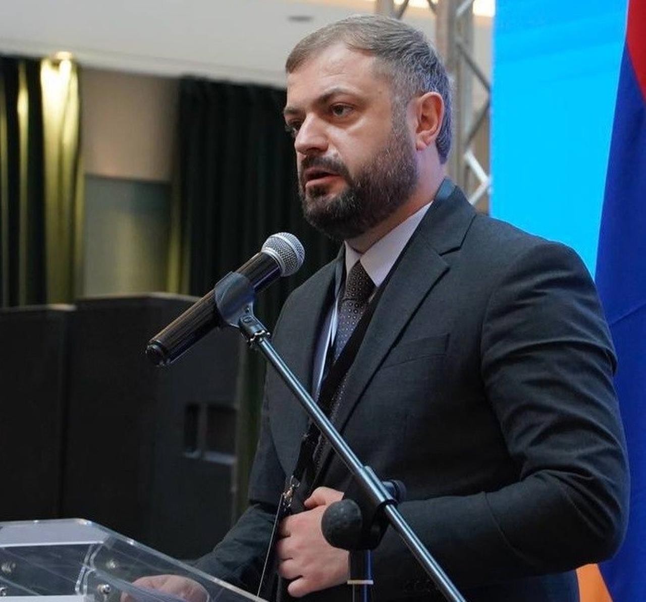 Armenian Economy Minister Gevorg Papoyan addresses the audience during a speech at a recent event in Yerevan, Armenia. (IHA Photo)