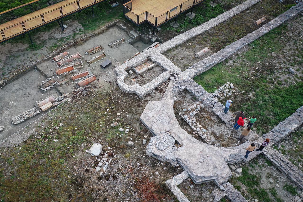 An aerial view of preparations for a planned religious ceremony around the submerged basilica ruins, discovered in 2014 in Lake Iznik, Bursa, Türkiye, believed to have been built in honor of Saint Neophytos, April 22, 2025. (AA Photo)
