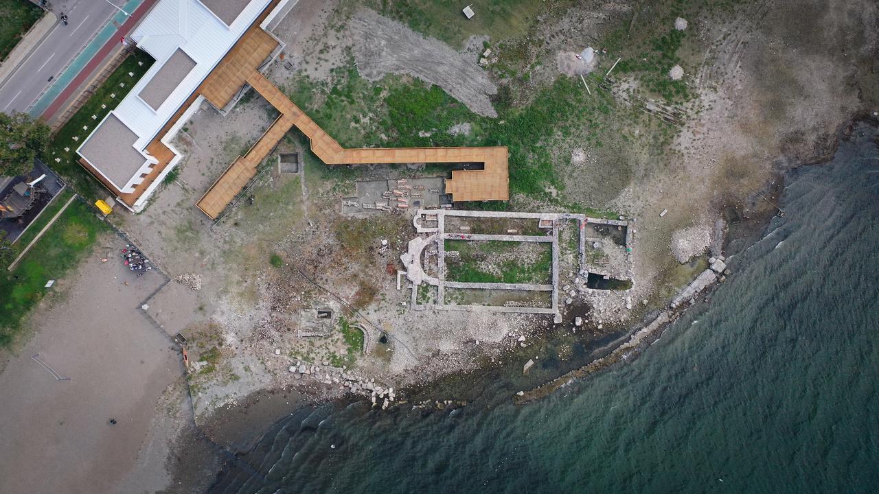 An aerial view of preparations for a planned religious ceremony around the submerged basilica ruins, discovered in 2014 in Lake Iznik, Bursa, Türkiye, believed to have been built in honor of Saint Neophytos, April 22, 2025. (AA Photo)