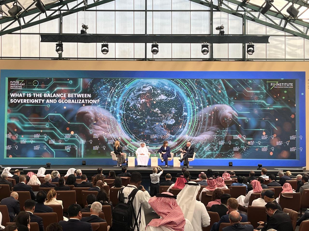 Turkish Treasury and Finance Minister Mehmet Simsek (R) speaks during a panel at the 9th Future Investment Initiative (FII) held in Riyadh, the capital of Saudi Arabia, October 28, 2025. (AA Photo)