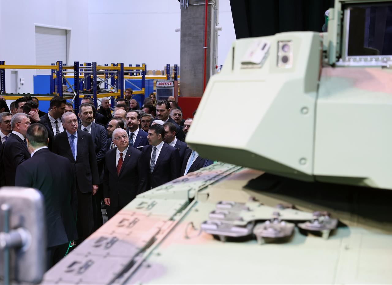 President Erdogan, along with other officials, looks at the Altay tanks at Kahramankazan district of Ankara, Türkiye, Oct. 28, 2025. (Photo via Turkish Presidency/Mustafa Kamaci)