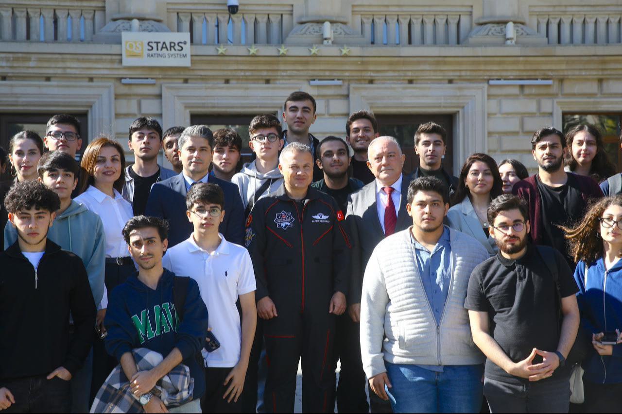 Türkiye's first astronaut, Alper Gezeravci, gave a presentation on Turkey’s National Space Program and the country’s first manned space mission at the Azerbaijan Technical University, where he also took photos with the university’s administration, academic staff, and students in Baku, Azerbaijan, on Oct. 28, 2025. (AA Photo)
