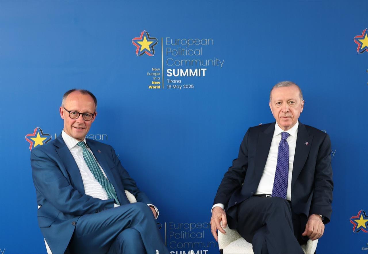 German Chancellor Friedrich Merz and Recep Tayyip Erdogan, President of Türkiye, sit together on the sidelines of the European Political Community summit in Tirana, Albania on May 16, 2025. (AA Photo)
