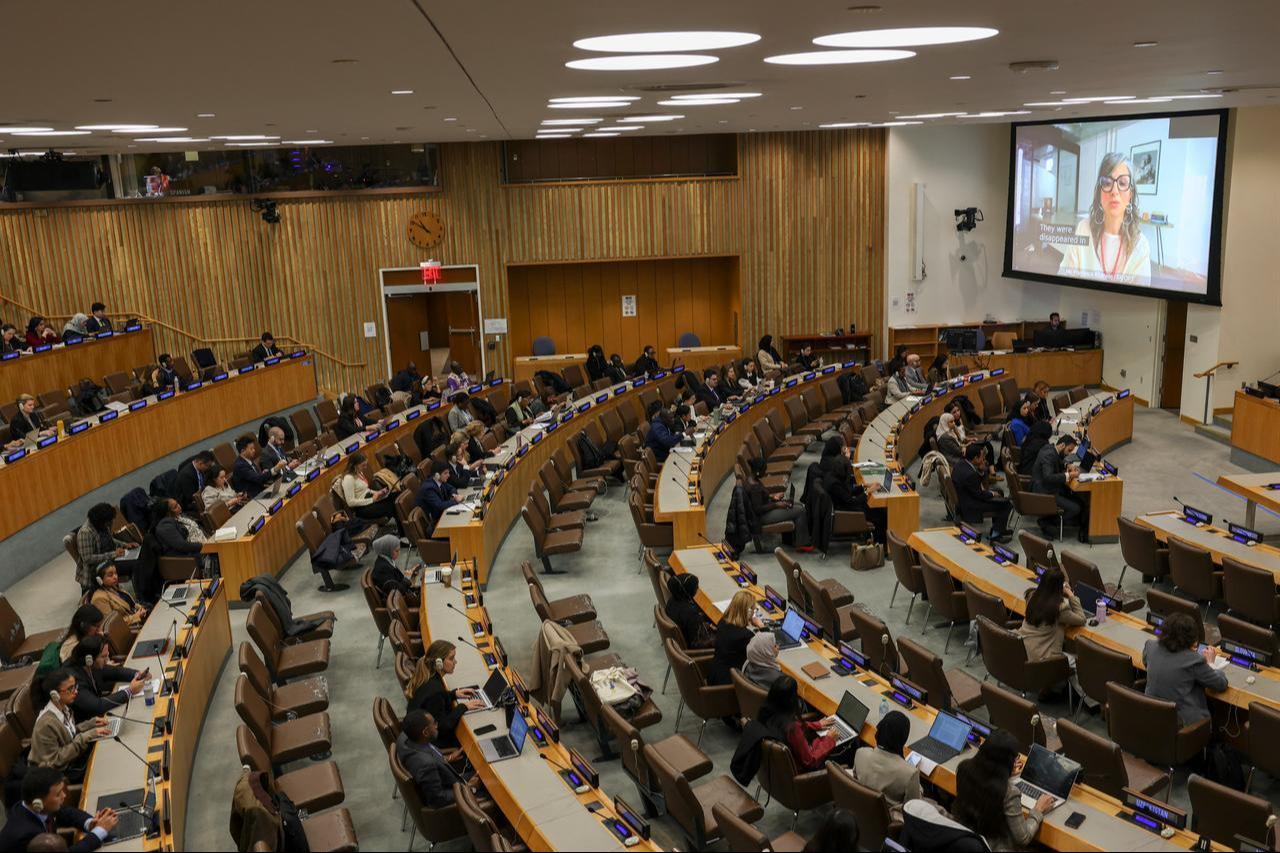 United Nations Special Rapporteur on the Occupied Palestinian Territories Francesca Albanese (seen on a screen) presents her report titled “Gaza Genocide: a collective crime” to the UN General Assembly at United Nations Headquarters on October 28, 2025 in New York. (AFP Photo)