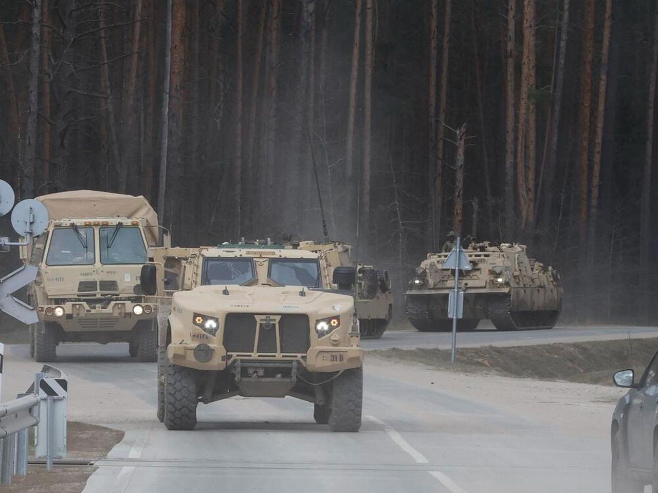 US Army military vehicles including two M88 Recovery vehicles roll to attend recovery efforts continuing for a missed US Army soldier at a training range in Pabrade, Lithuania, April 1, 2025. (AFP Photo)