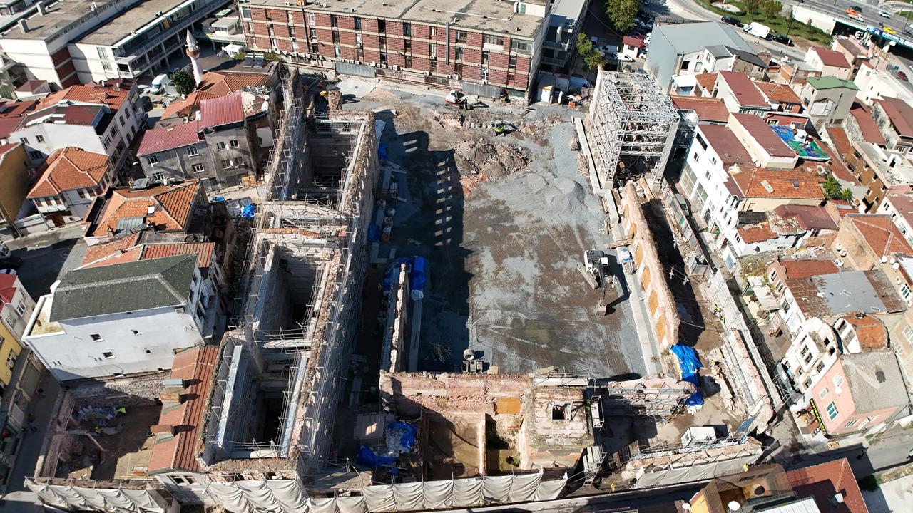 An aerial view of the ongoing restoration at the Ottoman-era Unkapani Mill in Istanbul’s Fatih district, overlooking the Golden Horn and the Galata Tower, Oct. 27, 2025. (IHA Photo)