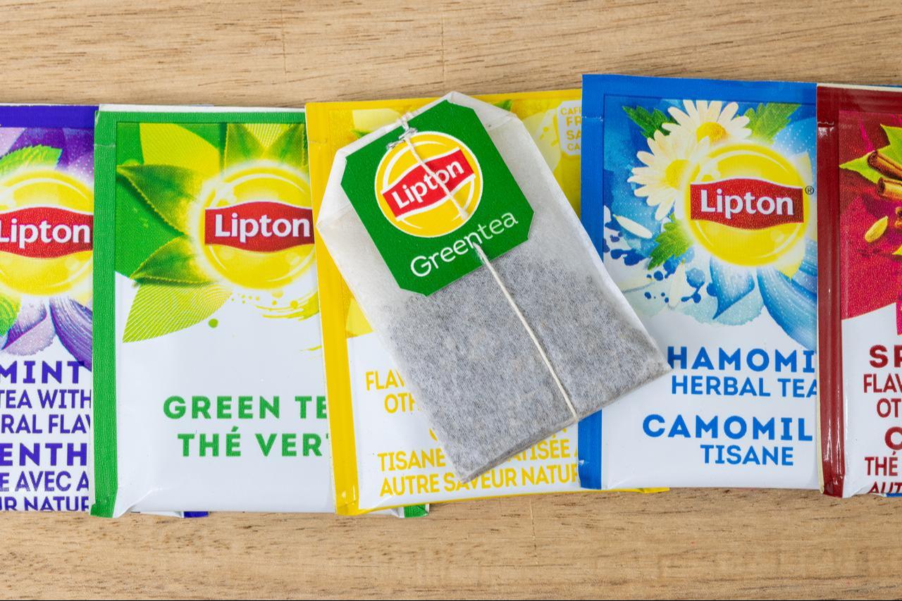 Diverse variety of Lipton tea bags. (Adobe Stock Photo)