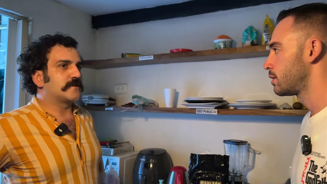 Pablo Akdogan talks with Turkish YouTuber Mert Ozturk in the kitchen of his shared house in Medellin, Colombia, Dec. 2024. (Photo via YouTube/@MertOzturk1)