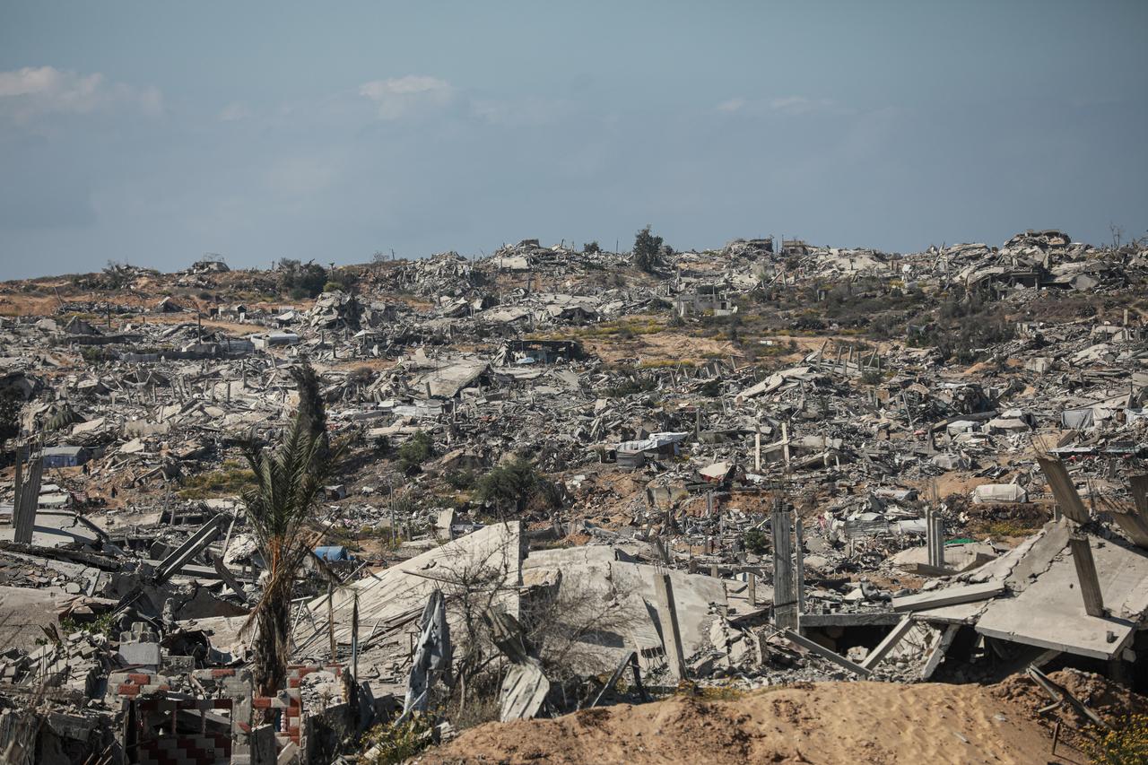 Palestinian families who returned to the city of Beit Lahia carry on with their lives with limited means among the buildings reduced to rubble by Israeli attacks in Gaza, Oct. 28, 2025. (AA Photo)