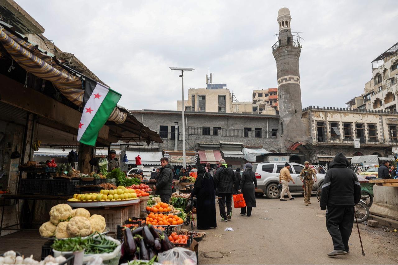 A Syrian flag hangs at a market in the central city of Homs on Jan. 4, 2025. (AFP Photo)