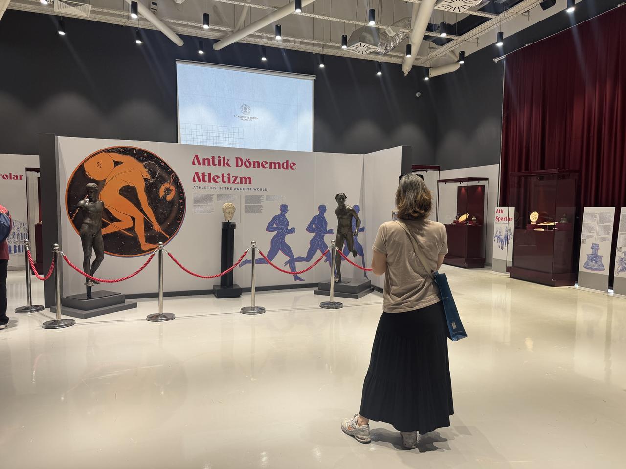 Visitors explore “The Story of Sports in Anatolia” exhibition, organized for the 102nd anniversary of the Republic, in Antalya, Türkiye, May 21, 2025. (AA Photo)
