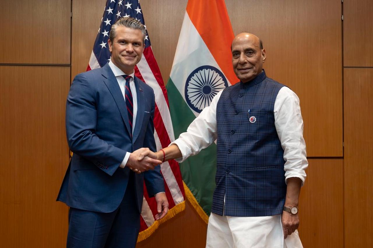 U.S. Defense Secretary Pete Hegseth shakes hands with Indian Defense Minister Rajnath Singh during their meeting in Kuala Lumpur, Malaysia, October 31, 2025. (Photo via X/@SecWar)