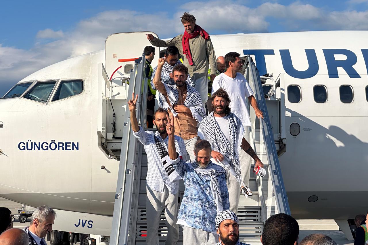 Activists from the Global Sumud Flotilla arrive at Istanbul Airport on a Turkish Airlines plane in Istanbul, Türkiye, on October 4, 2025. (AA Photo)