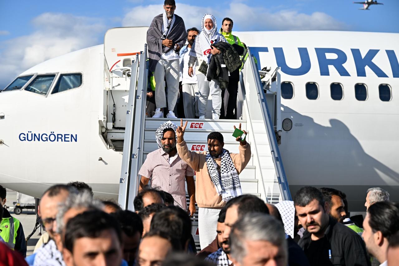 Activists from the Global Sumud Flotilla, who were detained by Israel in international waters, are welcomed after they arrive in Istanbul, Türkiye, October 4, 2025. (AA Photo)