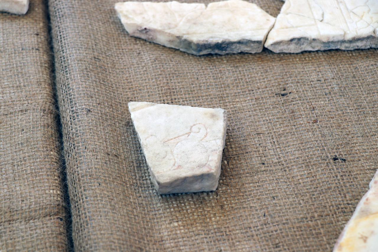 An Egyptian god Tutu figure found at the ancient city of Sagalassos, carved into Afyon marble slabs in Burdur, Türkiye, on October 4, 2025. (AA Photo)