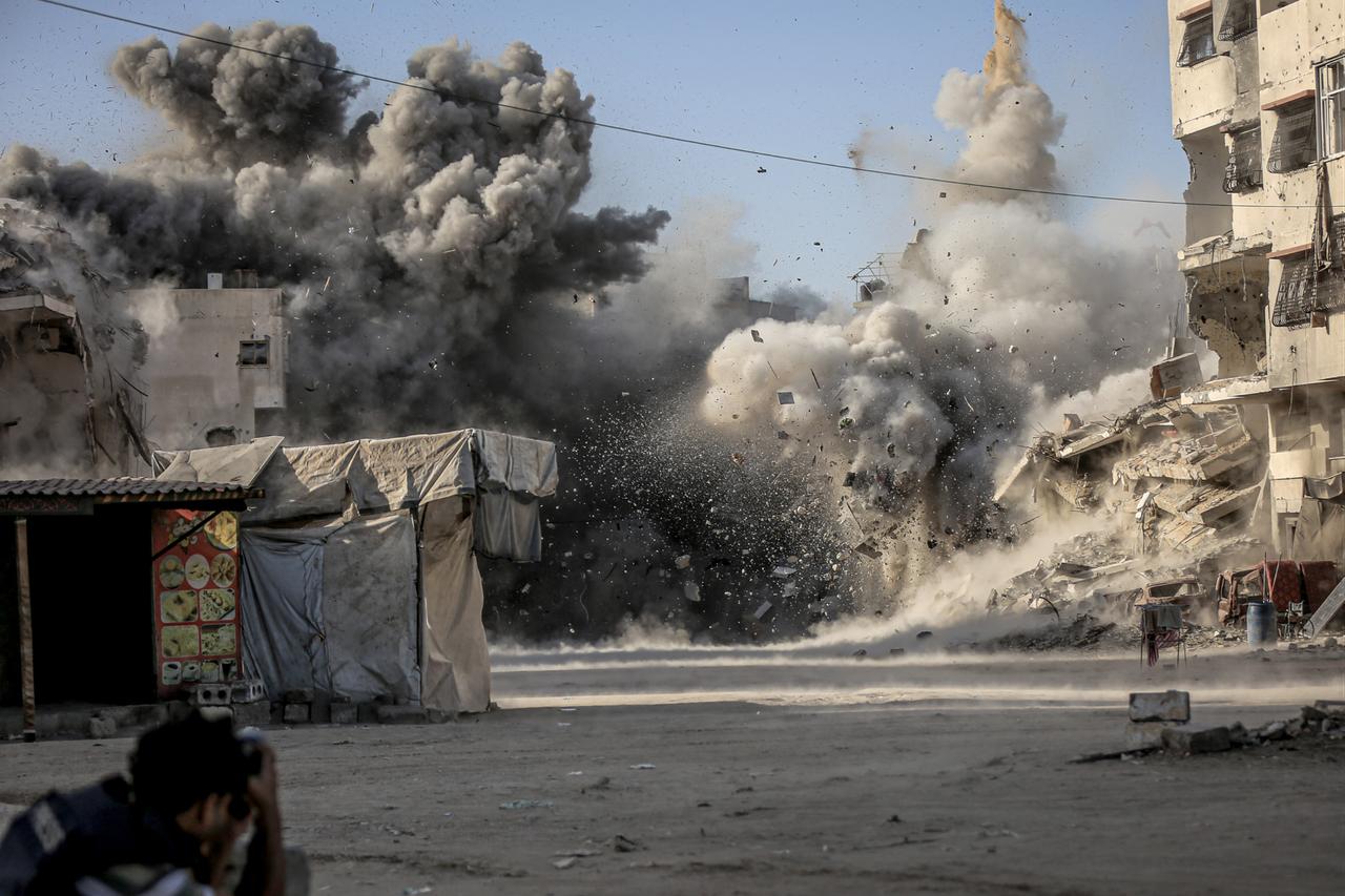 An explosion is seen following the Israeli attack on Omar al-Mukhtar Street in Gaza City, Gaza on October 3, 2025. (AA Photo)