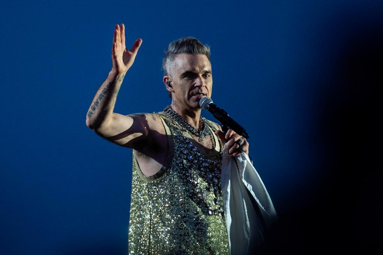 British singer-songwriter Robbie Williams performs at the Heartland Festival in Kvaerndrup, Denmark on June 10, 2023. (AFP Photo)