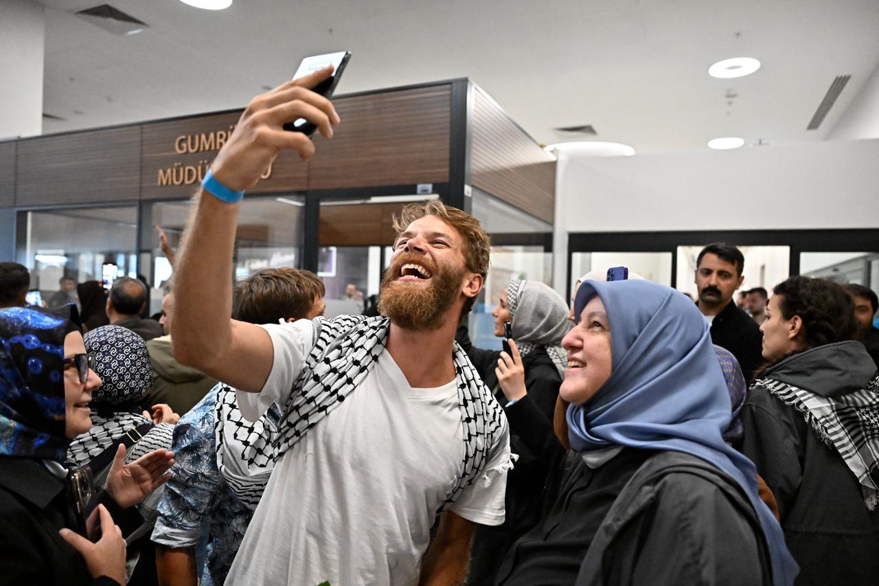 Activists from the Global Sumud Flotilla are welcomed after they arrive at Istanbul Airport in Istanbul, Türkiye on October 4, 2025. (AA Photo)