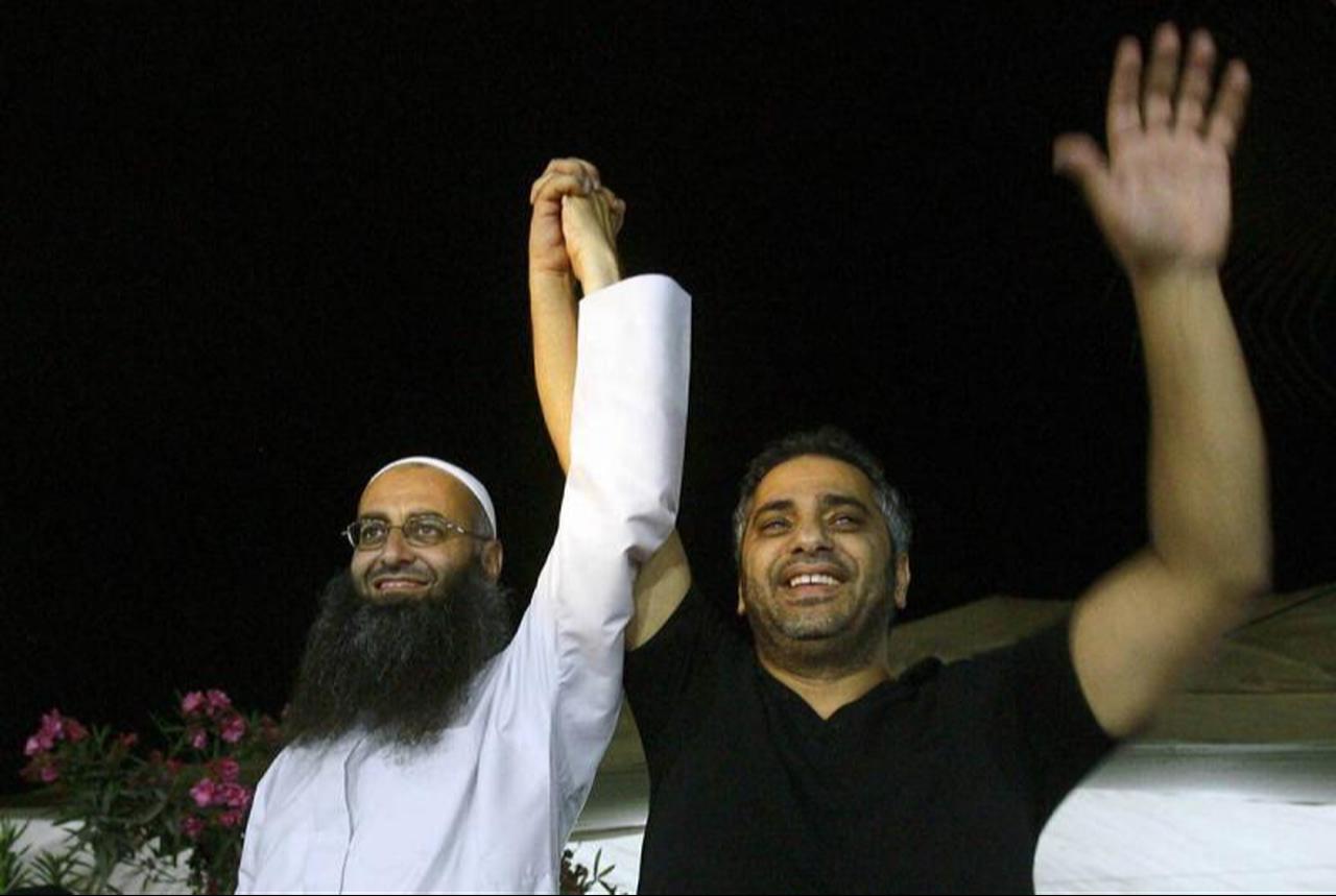 Lebanese singer Fadel Shaker appears at a July 2012 concert with Sheik Ahmad Assir. (AFP)