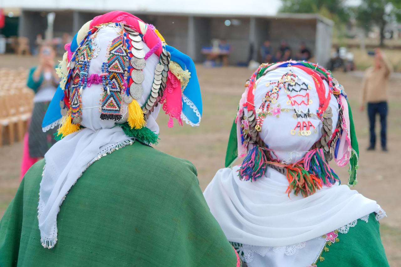 Newlywed brides wearing traditional headpieces adorned with beads. Kirklareli, Türkiye, October 5, 2025. (AA Photo)