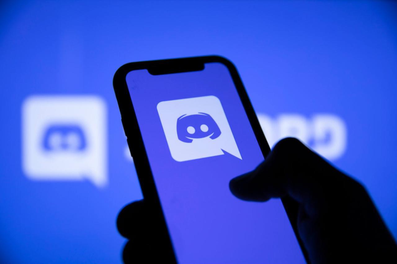 The Discord logo is displayed on a smartphone screen. (Adobe Stock Photo)
