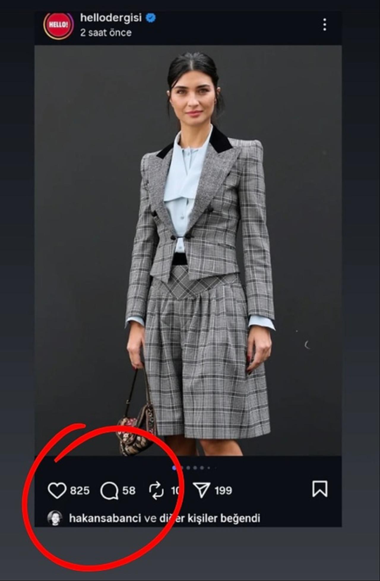 A screenshot shared by Turkish magazine HELLO! Türkiye shows actress Tuba Buyukustun posing in a grey checkered suit with black velvet collar details and a light blue blouse during Paris Fashion Week, Oct. 2025. (Photo via Instagram/@hellodergisi)