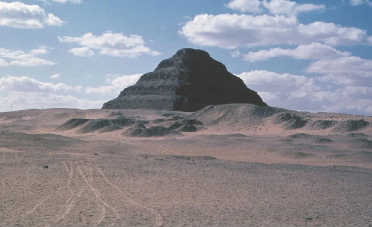 The Step Pyramid of Djoser, attributed to the architect Imhotep, who designed the pyramid as the tomb for the first king of the 3rd dynasty, at Saqqara, Egypt, c. 26th century B.C. (Photo via Britannica)
