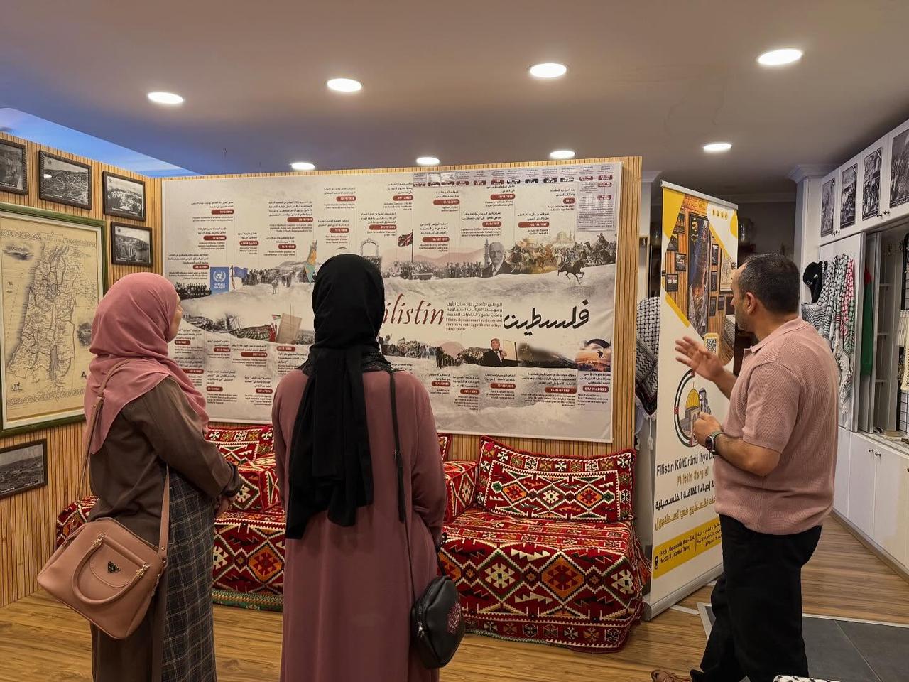 Visitors at the Palestine Museum in Istanbul examine a large map of Palestine. October 3, 2025. (Photo via the Palestine Museum in Istanbul)