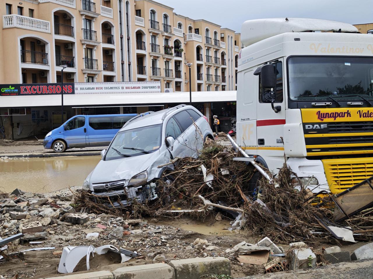 Vehicles were damaged on a muddy, flooded street in Elenite, Burgas, Bulgaria, October 4, 2025. (AFP Photo)