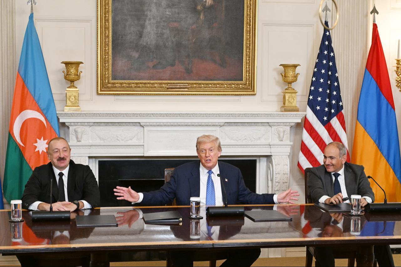 U.S. President Donald Trump (C), Azerbaijani President Ilham Aliyev (L), and Armenian Prime Minister Nikol Pashinyan (R) sign the joint declaration  peace roadmap in Washington D.C., Aug. 8, 2025. (Photo via Azerbaijan Presidency)
