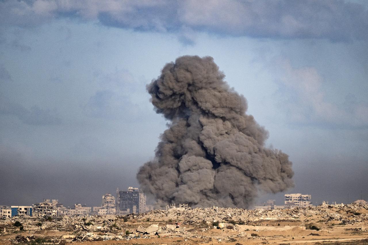 Smoke rises after Israeli airstrikes targeted residential areas in the Gaza Strip, as seen from Israel near the border, on October 7, 2025. (AA Photo)