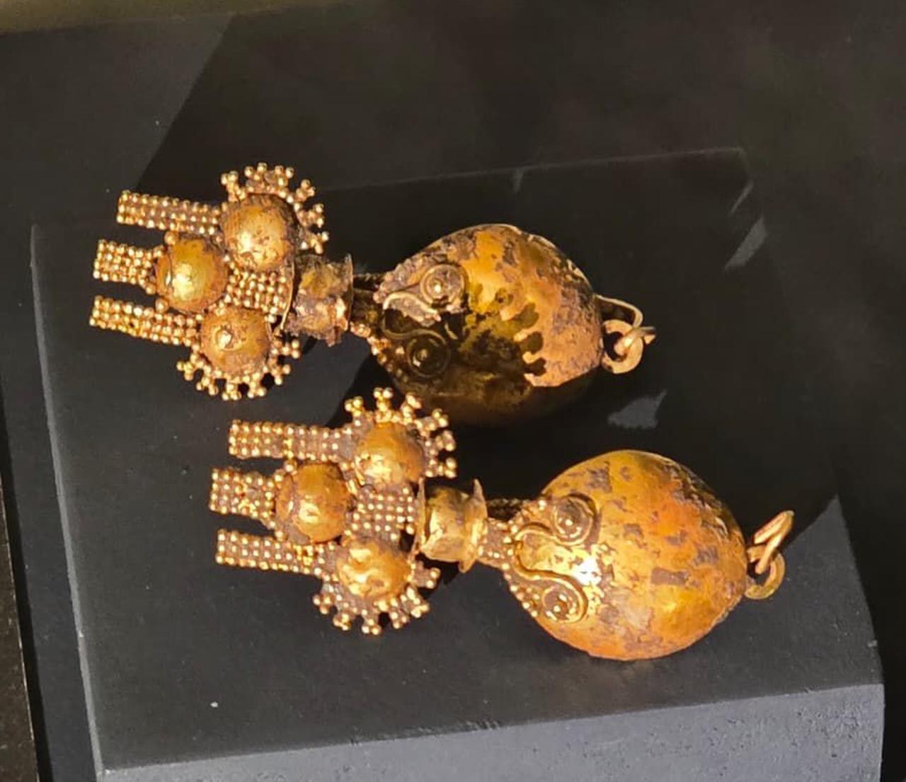 A pair of Late Bronze Age gold earrings featuring granulation technique, among the artifacts repatriated from Switzerland to Türkiye, Oct. 7, 2025. (Photo via Ministry of Culture and Tourism)