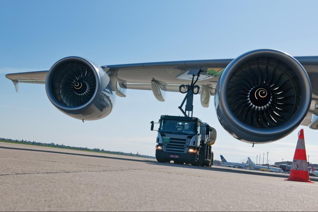 Aircraft engines undergo servicing on the tarmac. (Adobe Stock Photo)