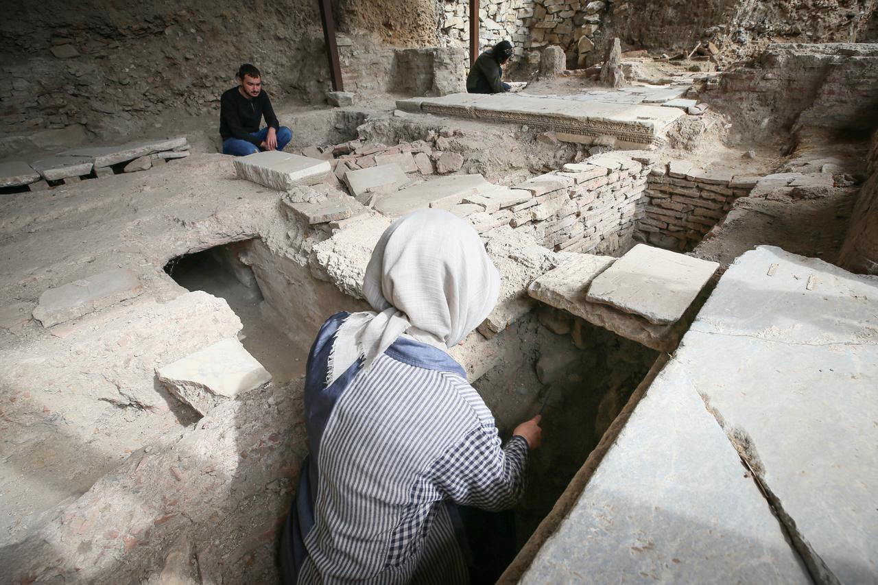 Excavation team members work within the Byzantine and Ottoman layers at the Iznik Tile Kilns site in Bursa, Türkiye, Oct. 7, 2025. (AA Photo)