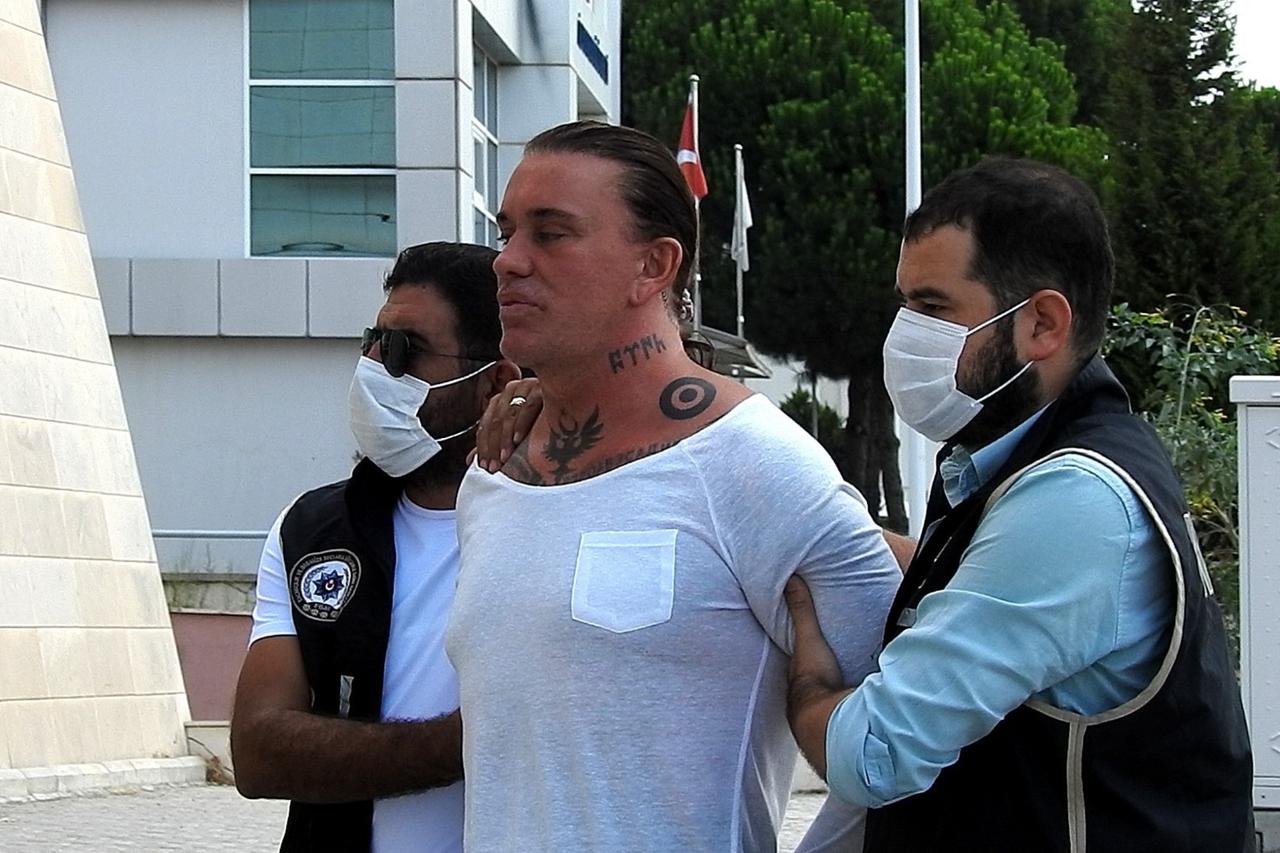 Hells Angels ringleader Coskun Necati Arabaci detained in Izmir, Türkiye, Oct. 5, 2025. (IHA Photo)