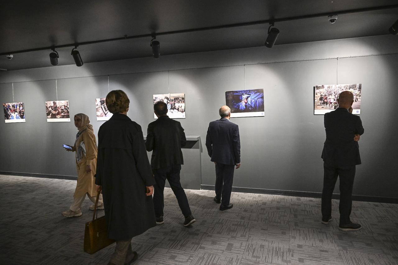 Guests observe photographs from Anadolu Agency’s The Witness exhibition on Gaza at the Umraniye Culture and Art Center in Istanbul, Türkiye, Oct. 7, 2025. (AA Photo)