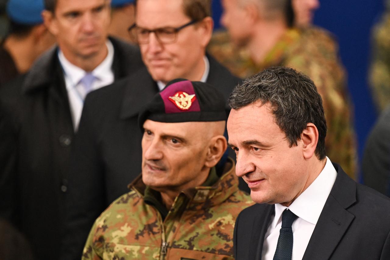 Kosovo Prime Minister Albin Kurti (R) takes part in the change of command ceremony at the Headquarters of the NATO-led KFOR Mission, in Camp Film City in Pristina, on Oct. 3, 2025. (AFP Photo)