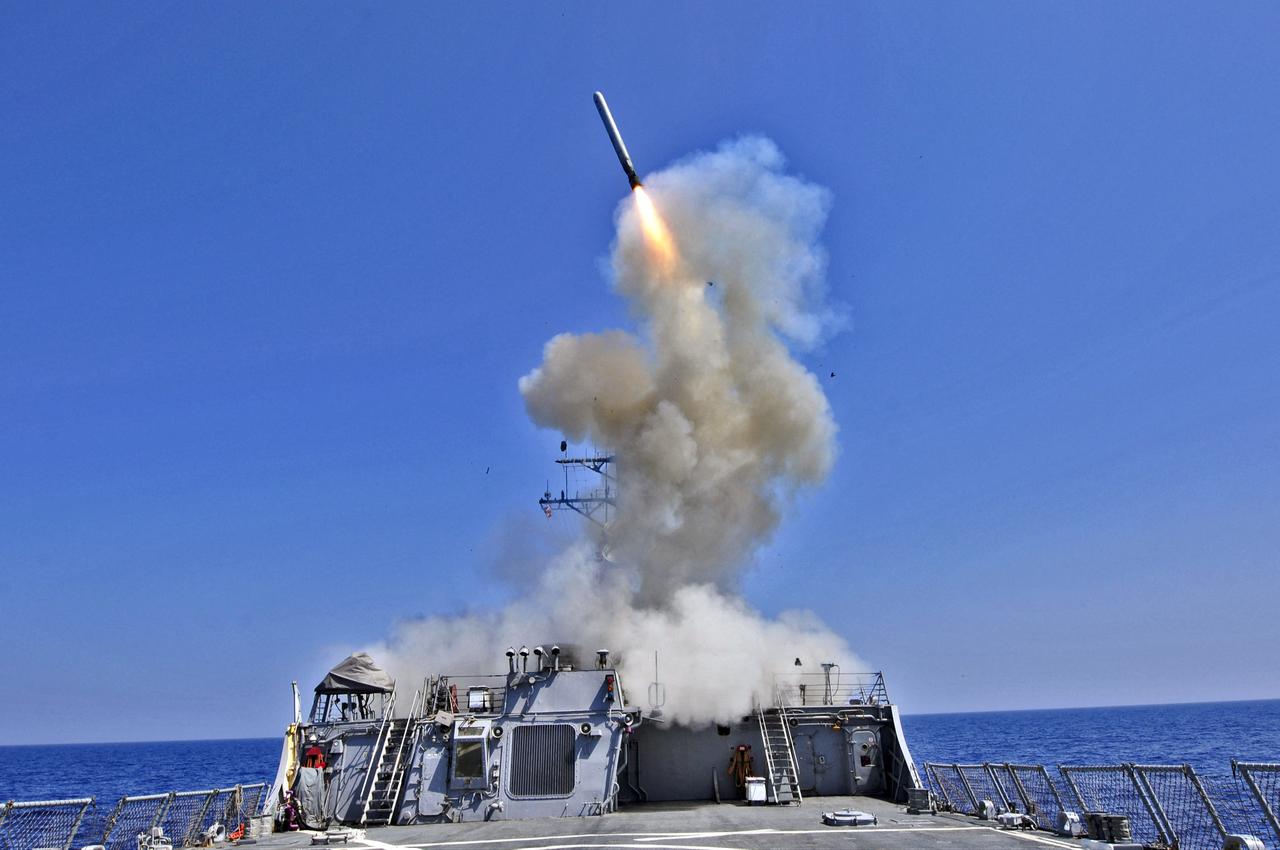 U.S. Navy guided-missile destroyer USS Barry (DDG 52) launches a Tomahawk cruise missile in support of Operation Odyssey Dawn March 29, 2011 from the Mediterranean Sea. (AFP Photo)