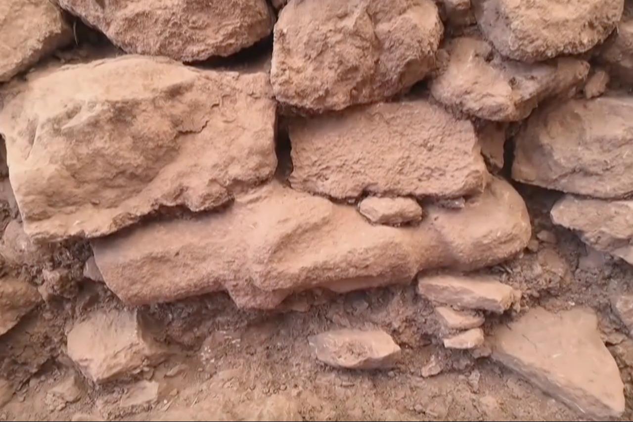 A close-up view of the chamber wall at Türkiye’s Gobeklitepe where a life-size human statue was discovered embedded as a ritual offering, Sanliurfa, Türkiye, Sept. 19, 2025. (AA Photo)