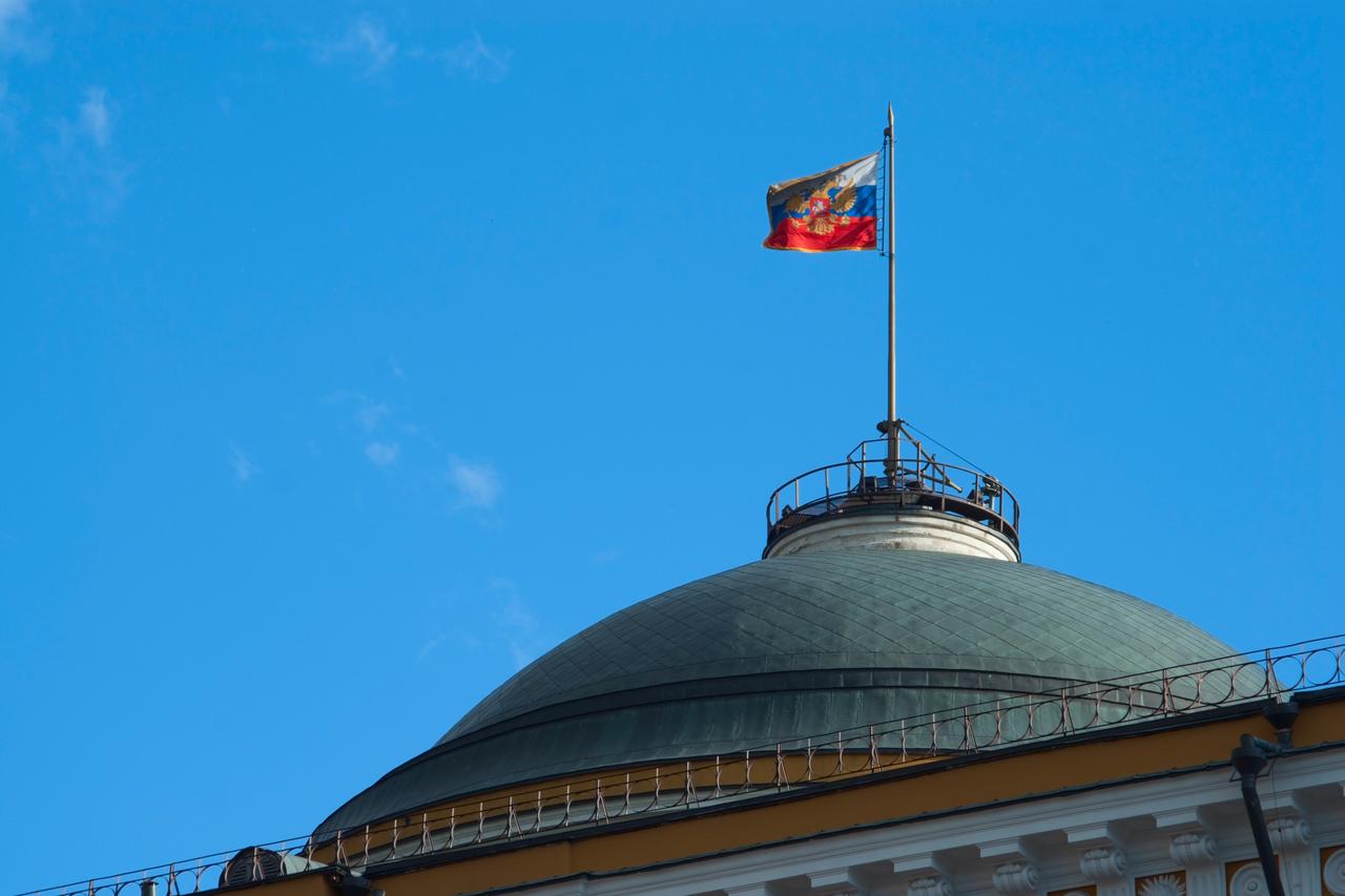 The Russian presidential standard flies over the Kremlin in Moscow, Russia. (Adobe Stock Photo)