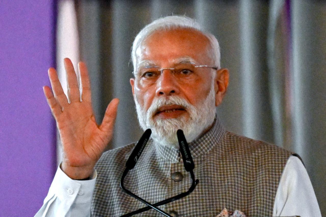 India's Prime Minister Narendra Modi speaks during the inauguration ceremony of phase one of the Navi Mumbai International Airport in Navi Mumbai on October 8, 2025. (AFP Photo)