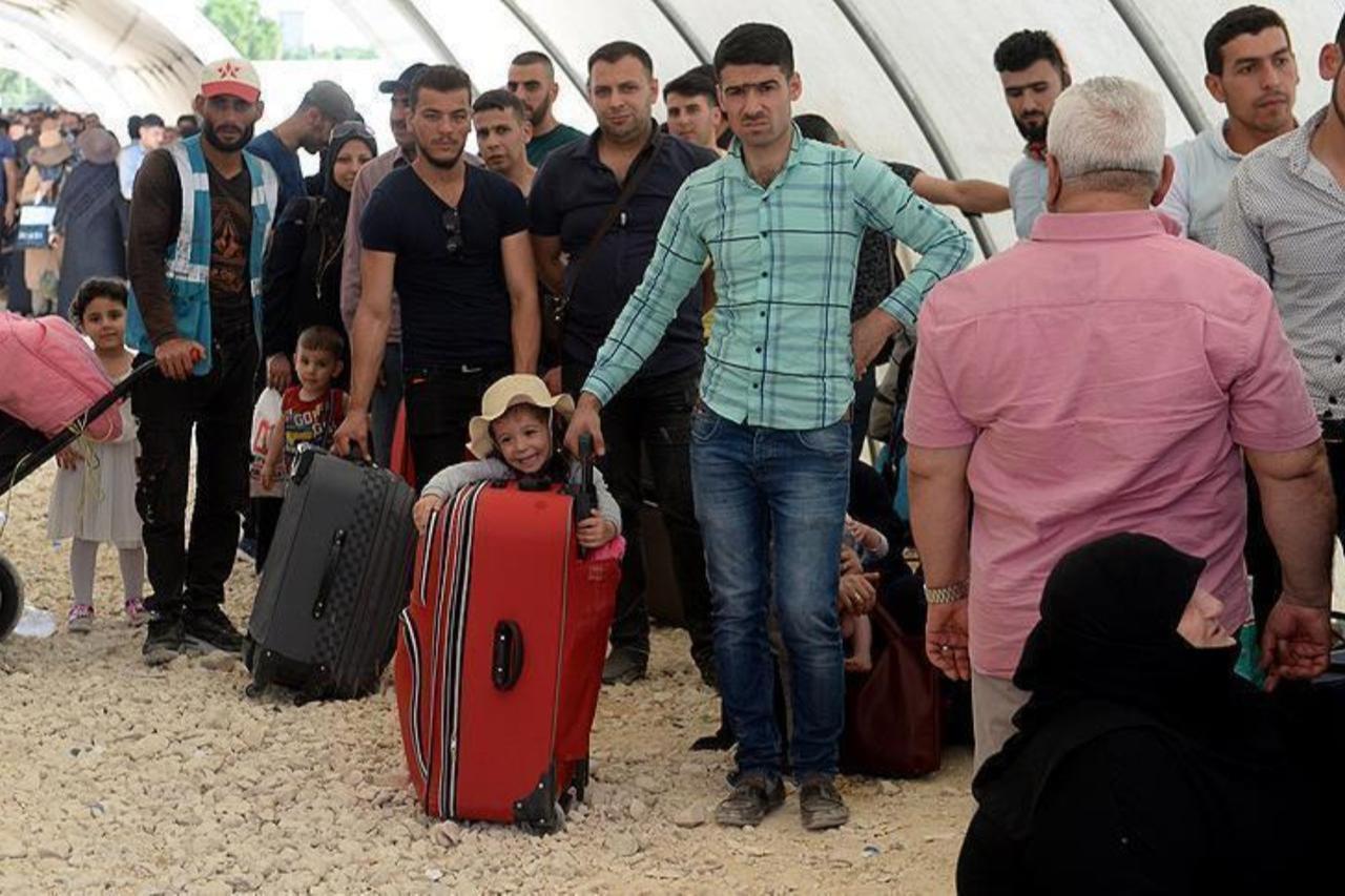 Syrian refugees return to Syria from Lebanon on Oct. 10, 2018. (photo by AA)
