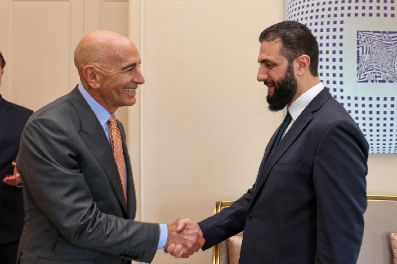 US Ambassador to Türkiye Thomas Barrack (L) shakes hands with Syrias jihadist-turned-interim President Ahmed al-Sharaa (R) during a meeting in Istanbul, Türkiye, May 24, 2025. (Turkish MFA)