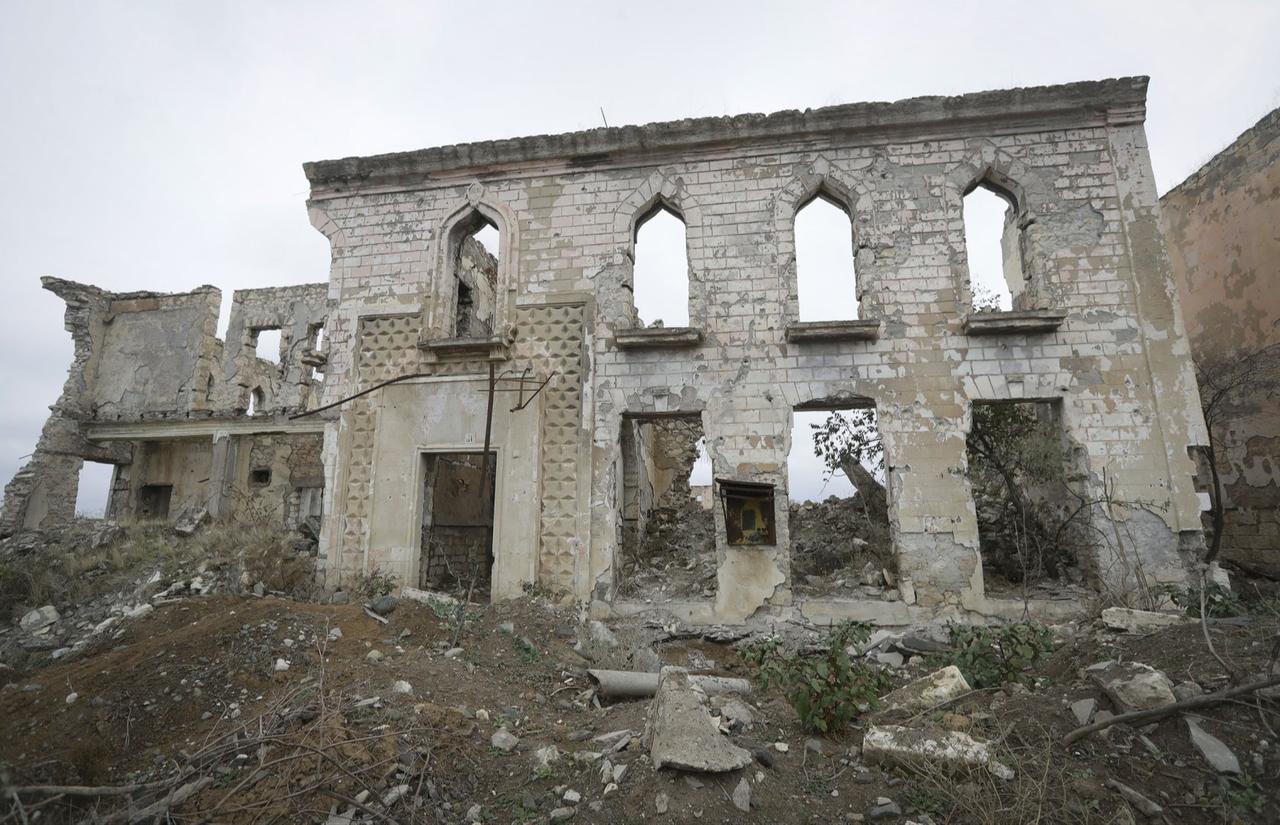 A view of a vast expanse of jagged concrete and houses reduced to ruins in Aghdam, after Azerbaijani forces were handed control of the city following a quarter-century of Armenian occupation, Aghdam, Azerbaijan, Nov. 20, 2020. (AP Photo)