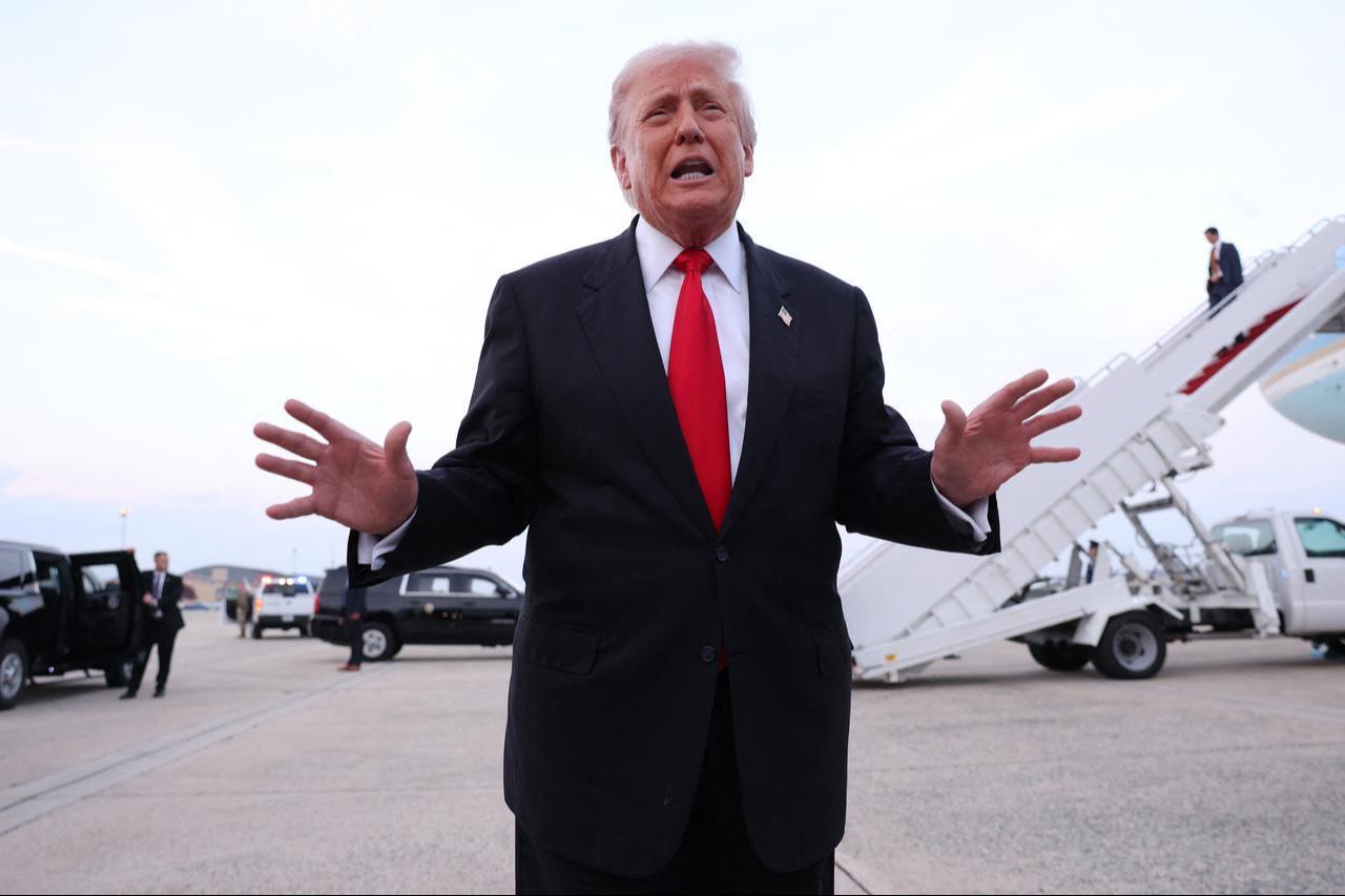 U.S. President Donald Trump gives brief remarks to members of the press after exiting Air Force One at Joint Base Andrews in Maryland, November 9, 2025. (AFP Photo)
