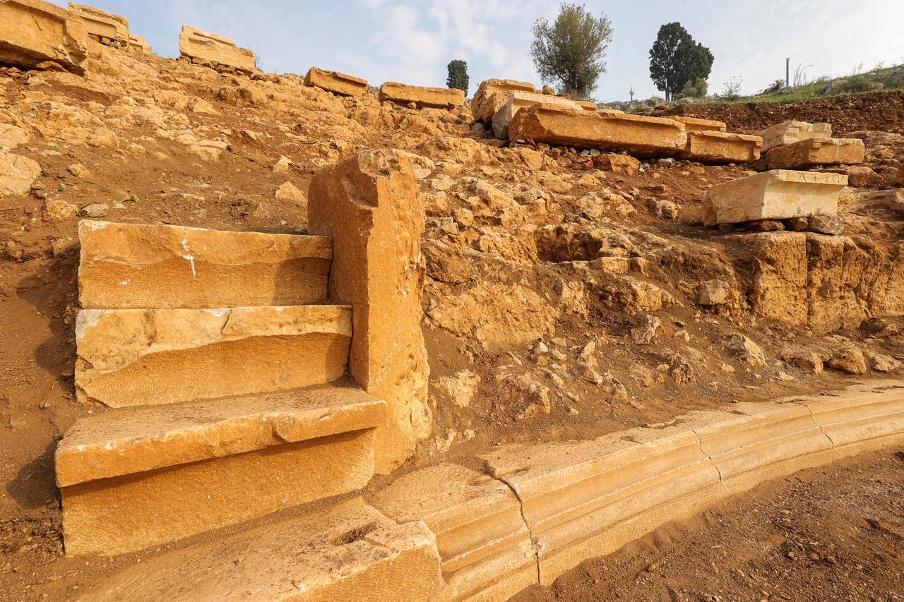 42 spectator seats discovered in scattered areas of the theater section of the ancient city of Apollonia ad Rhyndacum are relocated to their original places in Bursa, Türkiye, Nov. 6, 2025. (AA Photo)